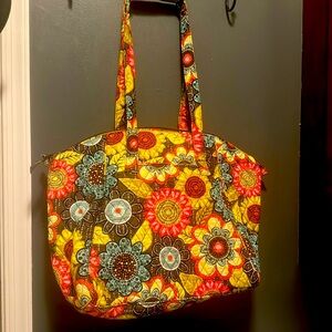 Vera Bradley tote bag with multiple inside pockets, inside zipped pocket also.